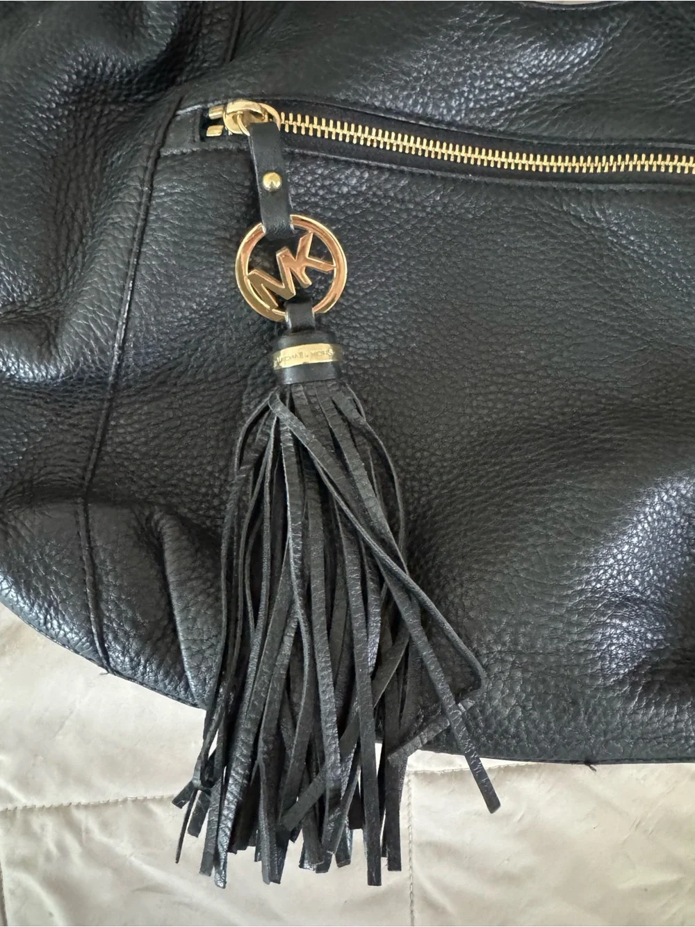 Michael Kors Black Leather purse with Tassel Charm